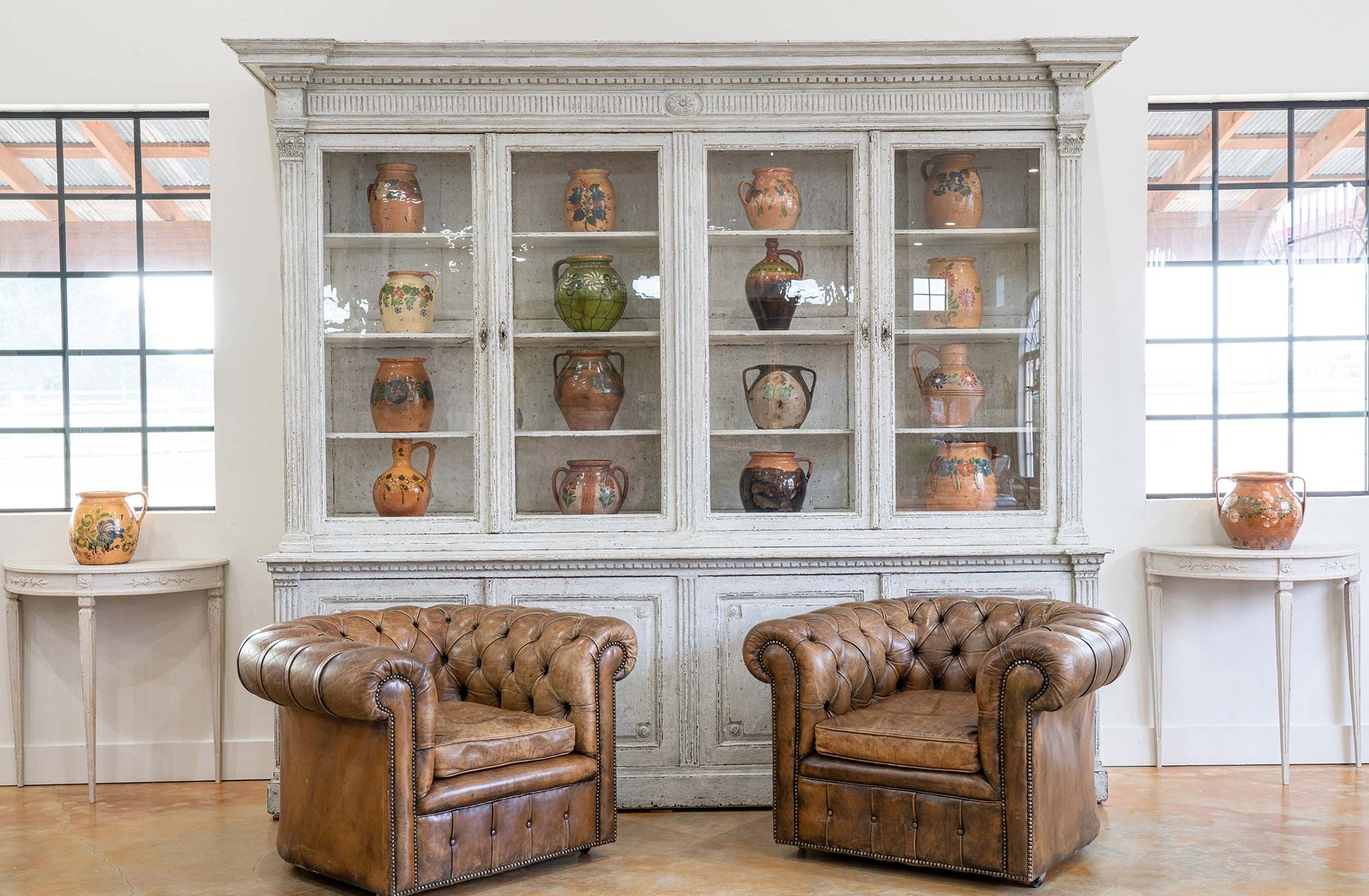Elegant display of authentic Scandinavian and Hungarian antiques featuring hand-carved Swedish furniture Danish mid-century modern pieces and intricate Hungarian ceramics reflecting the rich cultural heritage of each country