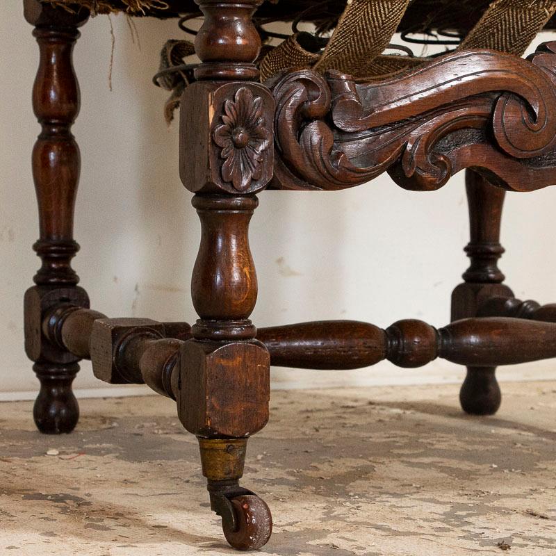 Antique Large Heavily Carved Arm Chair on Castors