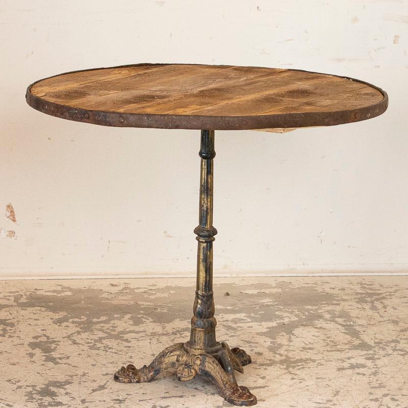 Vintage Round Bistro Table with Decorative Cast Iron Base